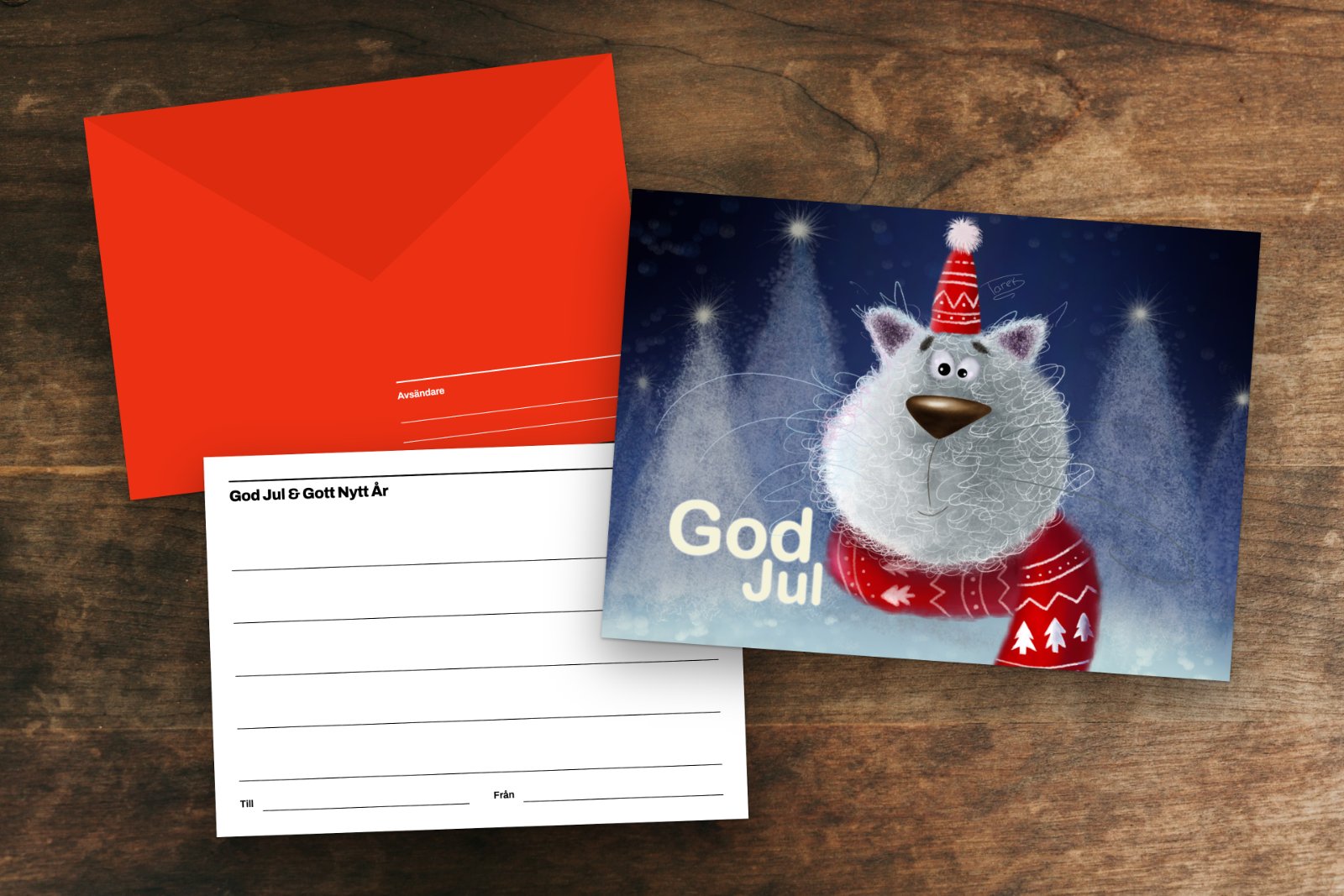God Jul card and envelope on a wooden table